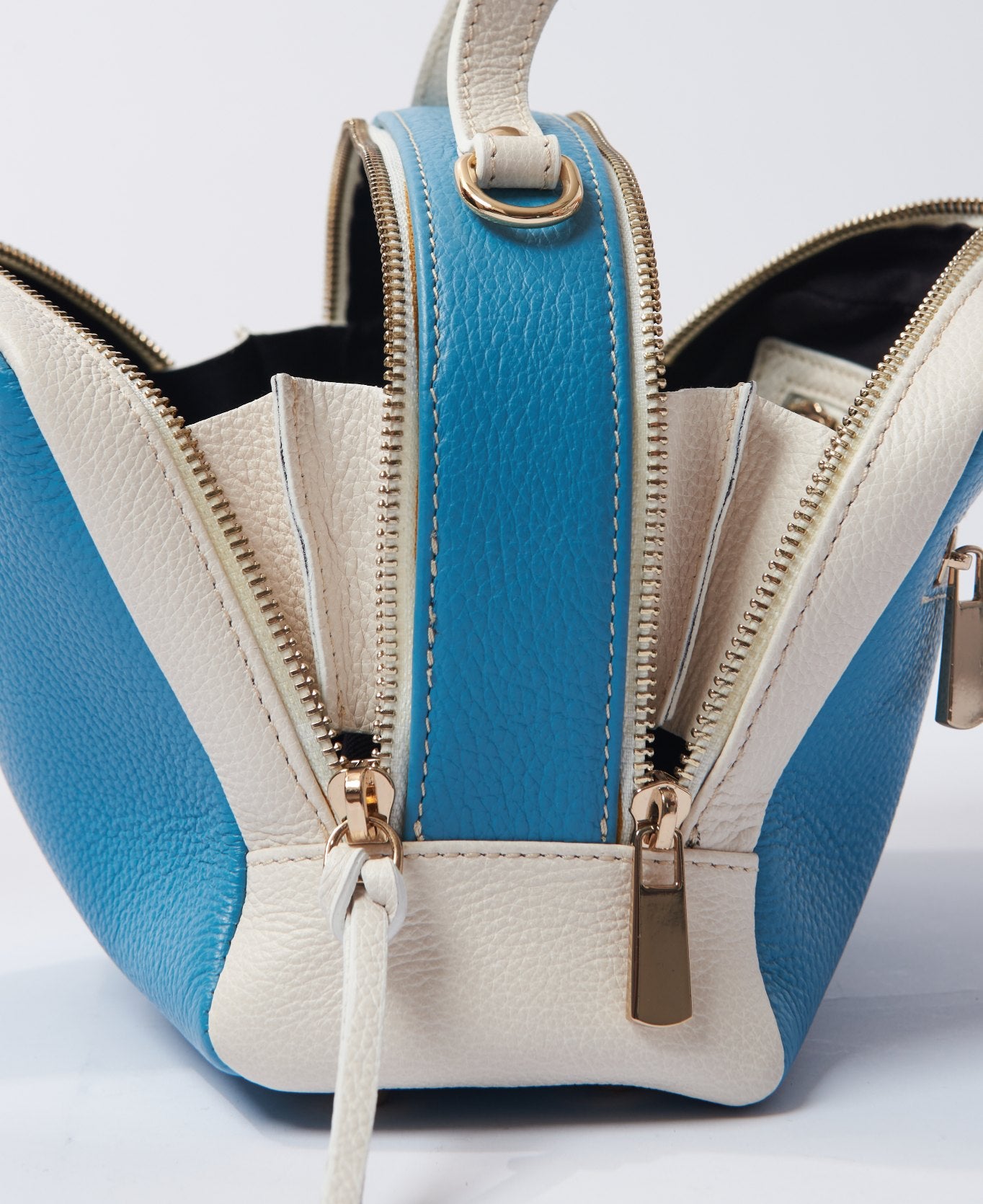 Camera leather bag bi-colour aqua and white