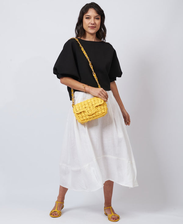 How to Style a Bidinis Raffia Bag: From Beach Vibes to Street Chic