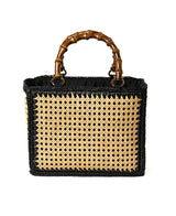 Borsa a secchiello in rattan e rafia con manico in bambù