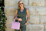 Borsa in pelle di coccodrillo goffrata Bugatti rosa tenue
